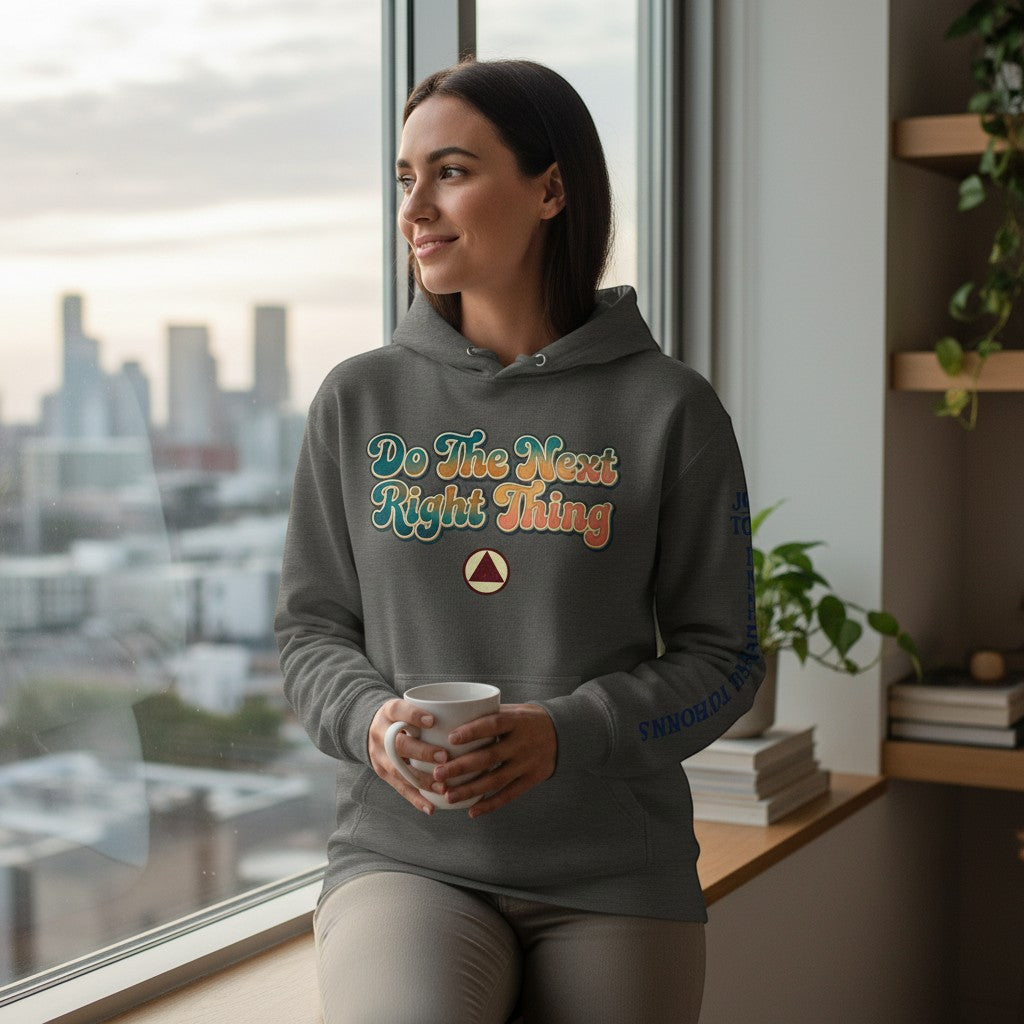 AmendsApparelCo dark grey cotton-polyester blend hoodie with "Do The Next Right Thing" graphic and a triangle logo.